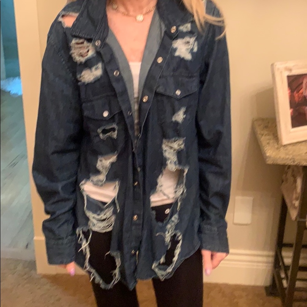 Ripped button down denim shirt